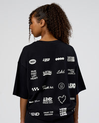 Woman wearing Grid FLXCotton Oversized Tee - Black-White | Model:Jordan | Size:L | Thumbnail Index: 2