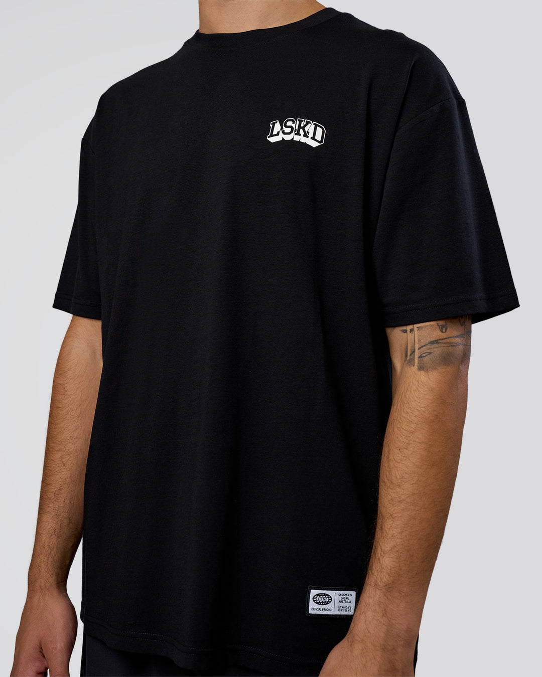 Man wearing Grid FLXCotton Oversized Tee - Black-White | Model:Zoran | Size:L - view 7