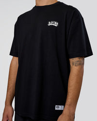 Man wearing Grid FLXCotton Oversized Tee - Black-White | Model:Zoran | Size:L | Thumbnail Index: 6
