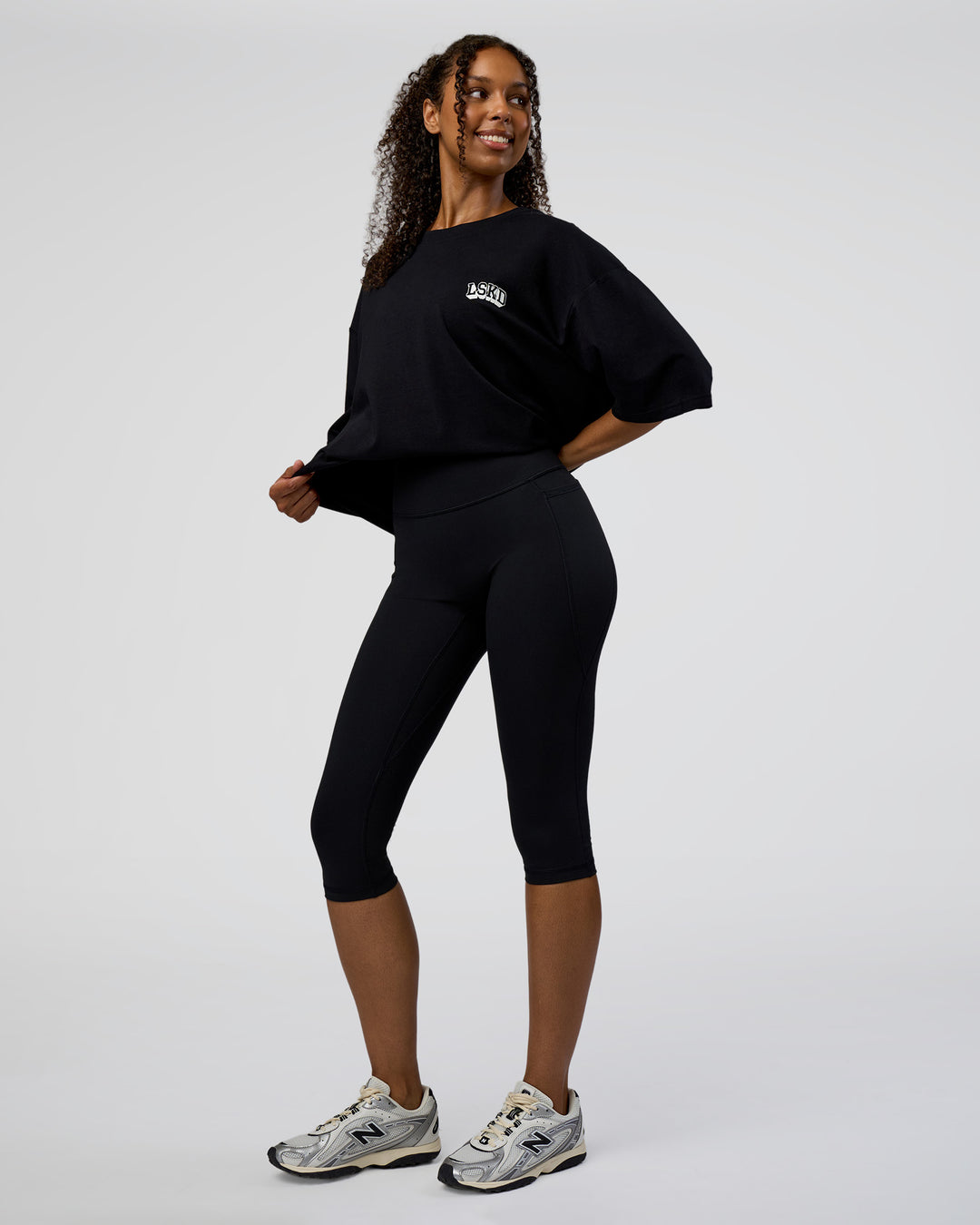 Woman wearing Grid FLXCotton Oversized Tee - Black-White | Model:Jordan | Size:L - view 6