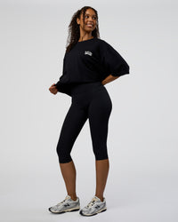 Woman wearing Grid FLXCotton Oversized Tee - Black-White | Model:Jordan | Size:L | Thumbnail Index: 5