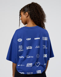 Woman wearing Grid FLXCotton Oversized Tee - Power Cobalt-White | Model:Jordan | Size:L | Thumbnail Index: 3
