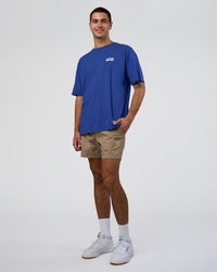 Man wearing Grid FLXCotton Oversized Tee - Power Cobalt-White | Model:Zoran | Size:L | Thumbnail Index: 4