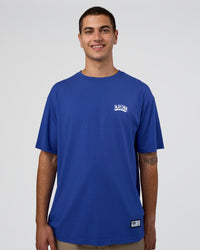 Man wearing Grid FLXCotton Oversized Tee - Power Cobalt-White | Model:Zoran | Size:L | Thumbnail Index: 0