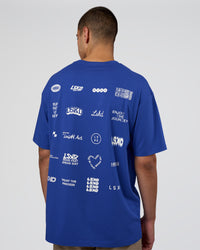 Man wearing Grid FLXCotton Oversized Tee - Power Cobalt-White | Model:Zoran | Size:L | Thumbnail Index: 1