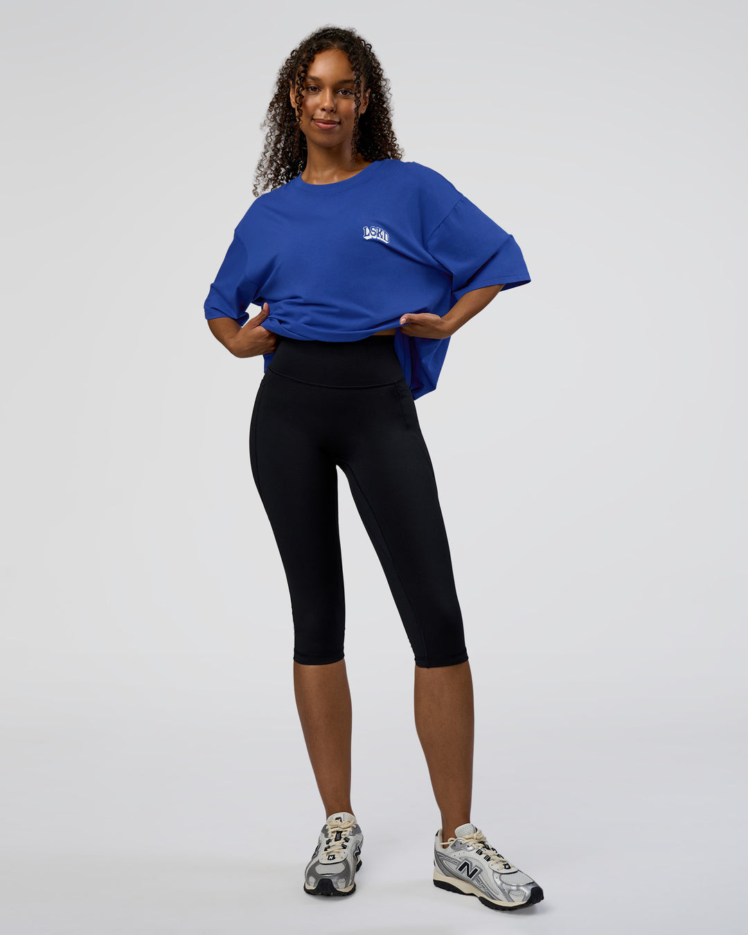 Woman wearing Grid FLXCotton Oversized Tee - Power Cobalt-White | Model:Jordan | Size:L - view 6