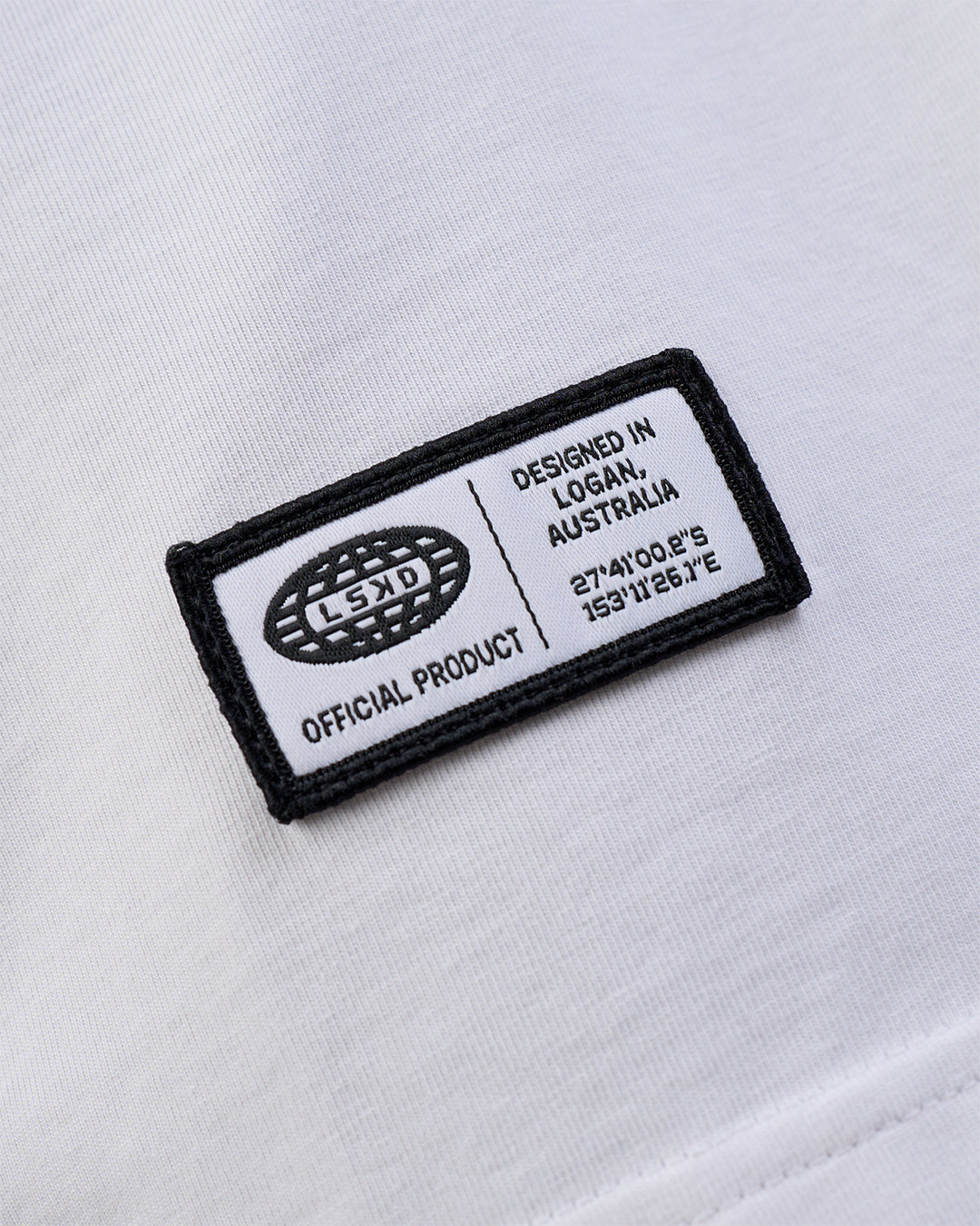 Man wearing Grid FLXCotton Oversized Tee - White-Black | Model:Zoran | Size:L - view 9