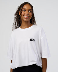 Woman wearing Grid FLXCotton Oversized Tee - White-Black | Model:Jordan | Size:L | Thumbnail Index: 3