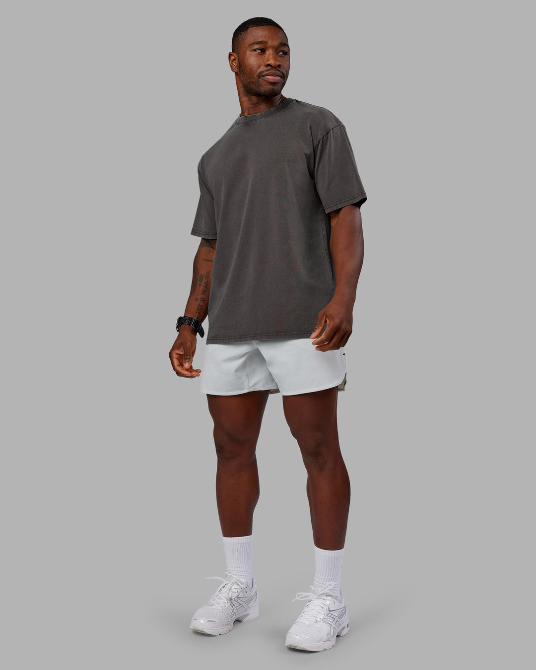 Man wearing Heart FLXCotton Oversized Tee - Washed Dark Storm-Violet Ray | Model:Sam | Size:L - view 9