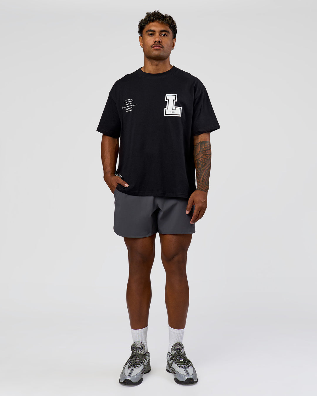 Man wearing Hype Heavyweight Unisex Oversized Tee - Black-White | Model:Xavier | Size:L - view 5