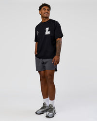 Man wearing Hype Heavyweight Unisex Oversized Tee - Black-White | Model:Xavier | Size:L | Thumbnail Index: 5