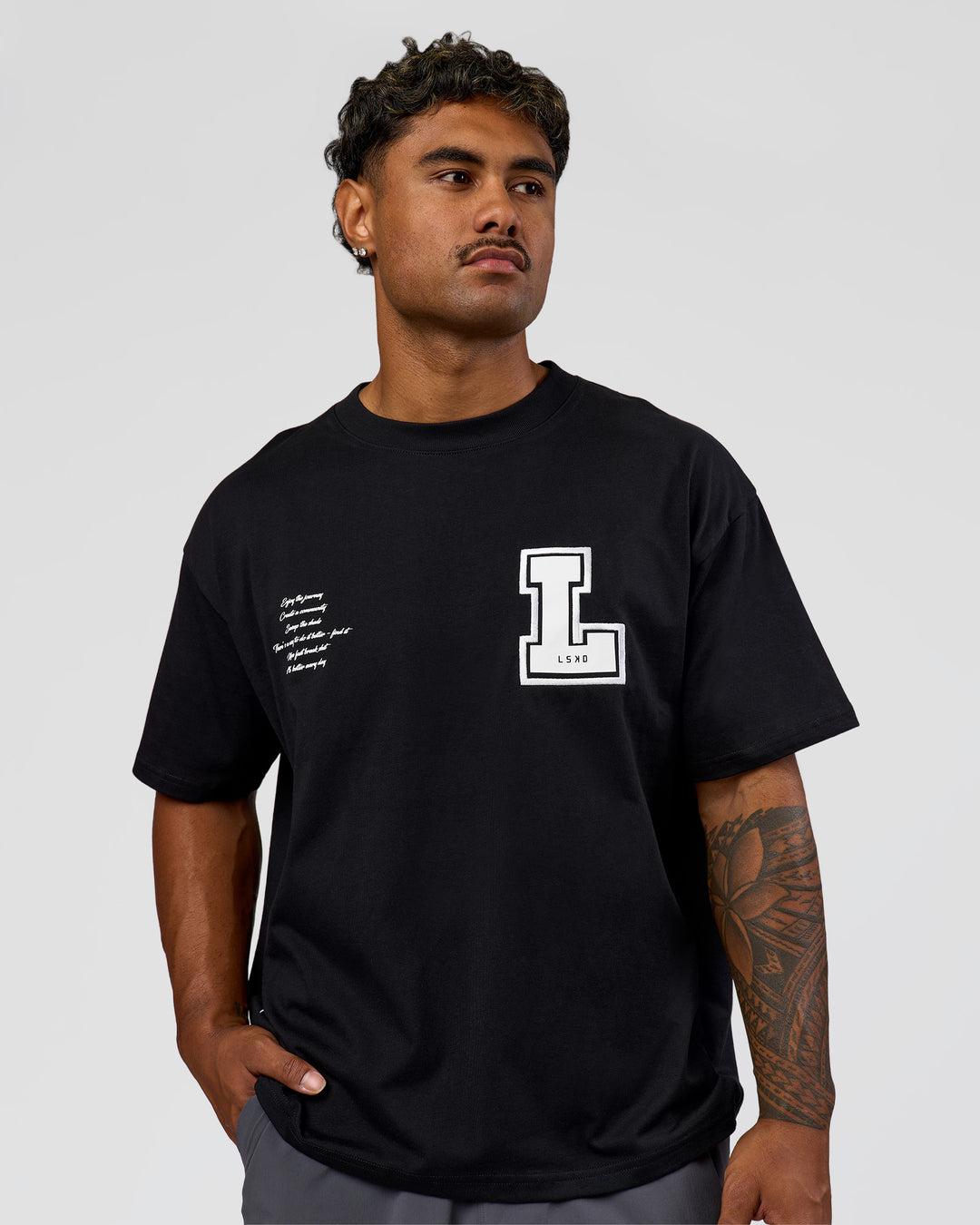 Man wearing Hype Heavyweight Unisex Oversized Tee - Black-White | Model:Xavier | Size:L - view 7