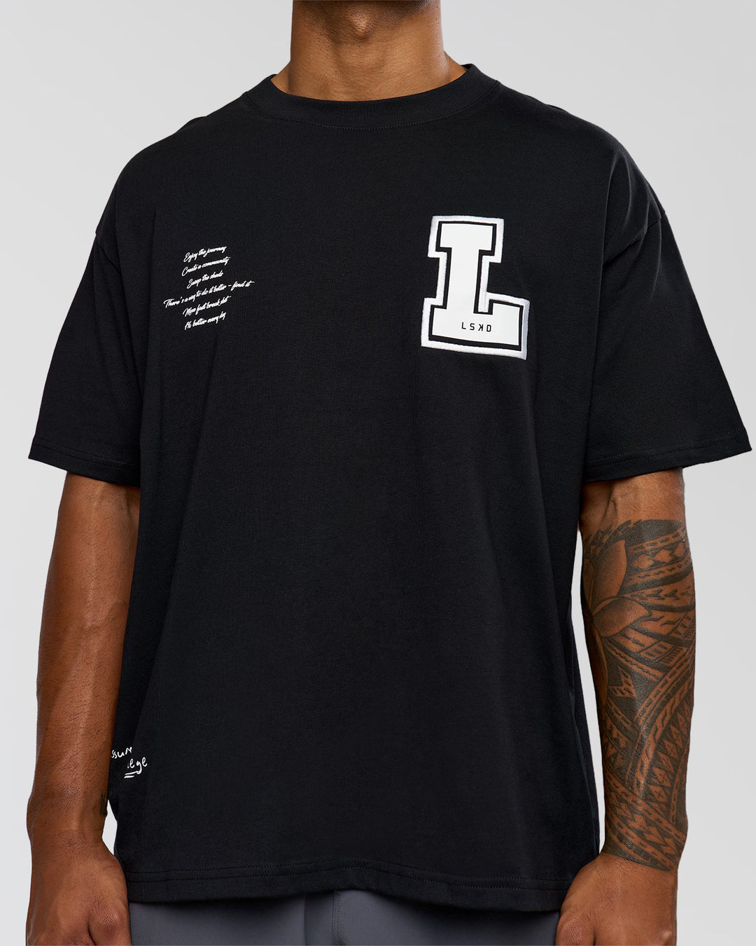 Man wearing Hype Heavyweight Unisex Oversized Tee - Black-White | Model:Xavier | Size:L - view 8
