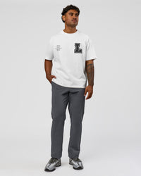 Man wearing Hype Heavyweight Unisex Oversized Tee - Off White-Black | Model:Xavier | Size:L | Thumbnail Index: 3