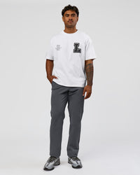 Man wearing Hype Heavyweight Unisex Oversized Tee - Off White-Black | Model:Xavier | Size:L | Thumbnail Index: 4