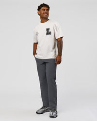 Man wearing Hype Heavyweight Unisex Oversized Tee - Off White-Black | Model:Xavier | Size:L | Thumbnail Index: 5