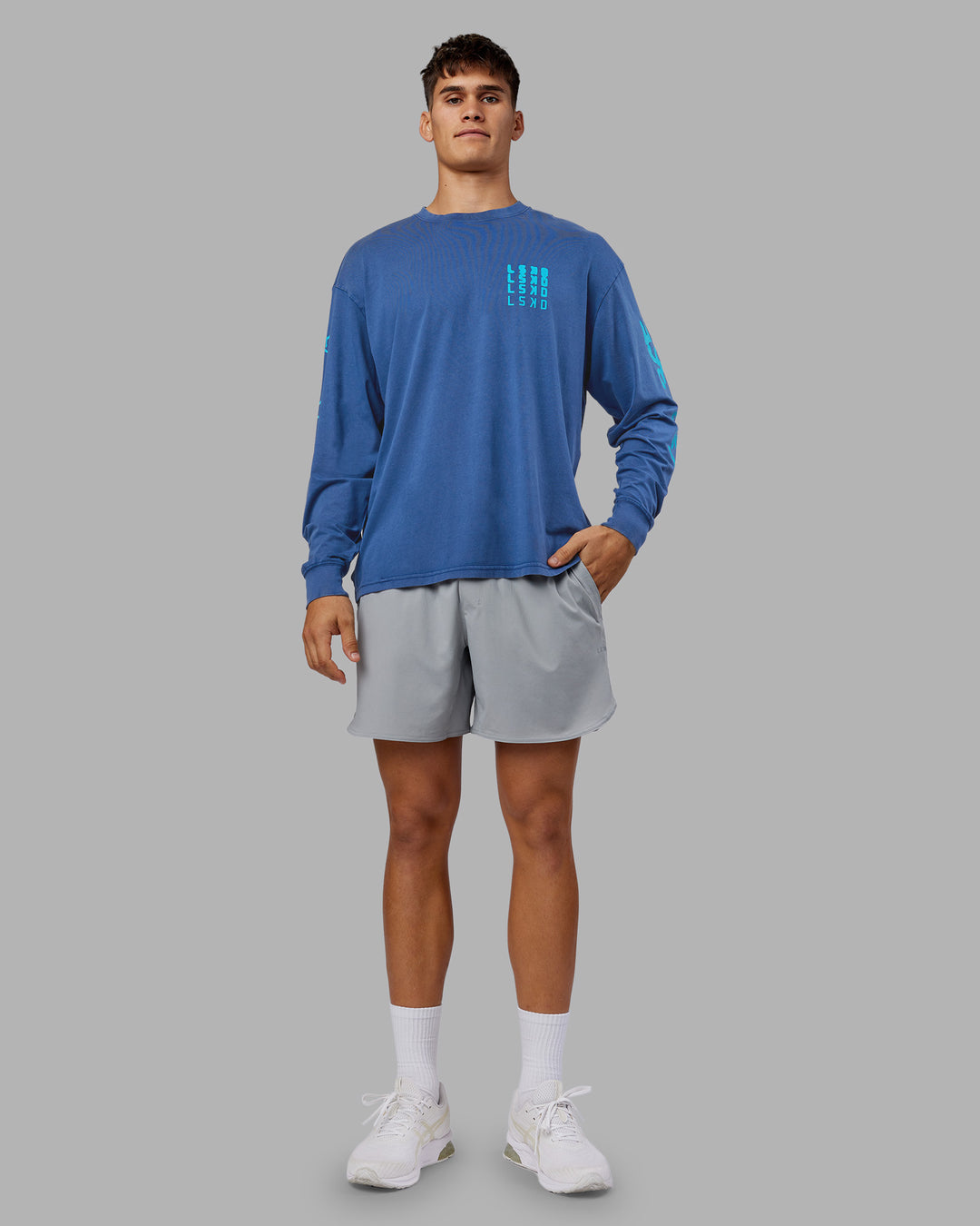 Man wearing Inferno Journey FLXCotton Oversized Long Sleeve Tee - Midnight Blue-Blue Bird | Model:Jackson | Size:L - view 8