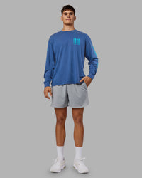 Man wearing Inferno Journey FLXCotton Oversized Long Sleeve Tee - Midnight Blue-Blue Bird | Model:Jackson | Size:L | Thumbnail Index: 7