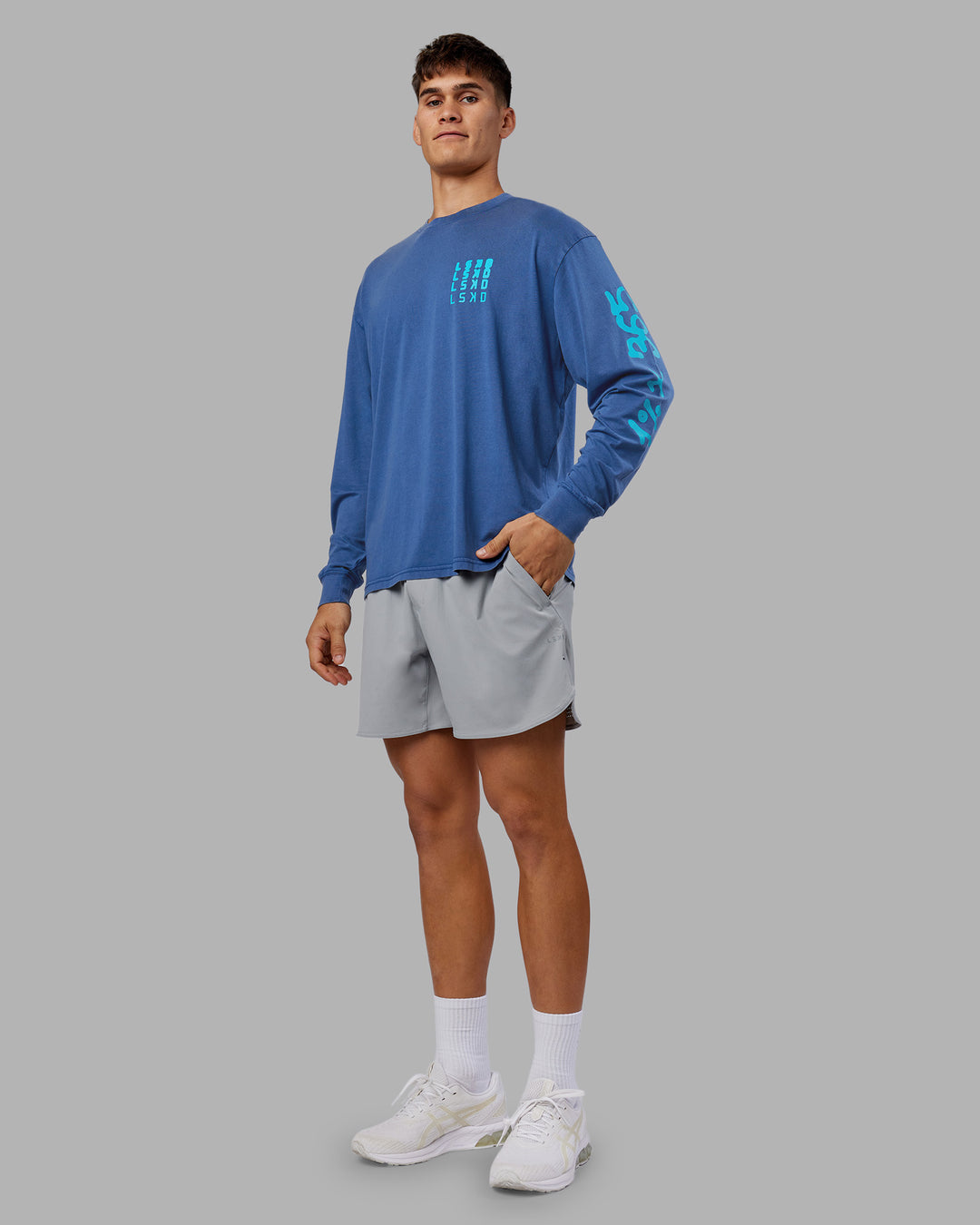 Man wearing Inferno Journey FLXCotton Oversized Long Sleeve Tee - Midnight Blue-Blue Bird | Model:Jackson | Size:L - view 11