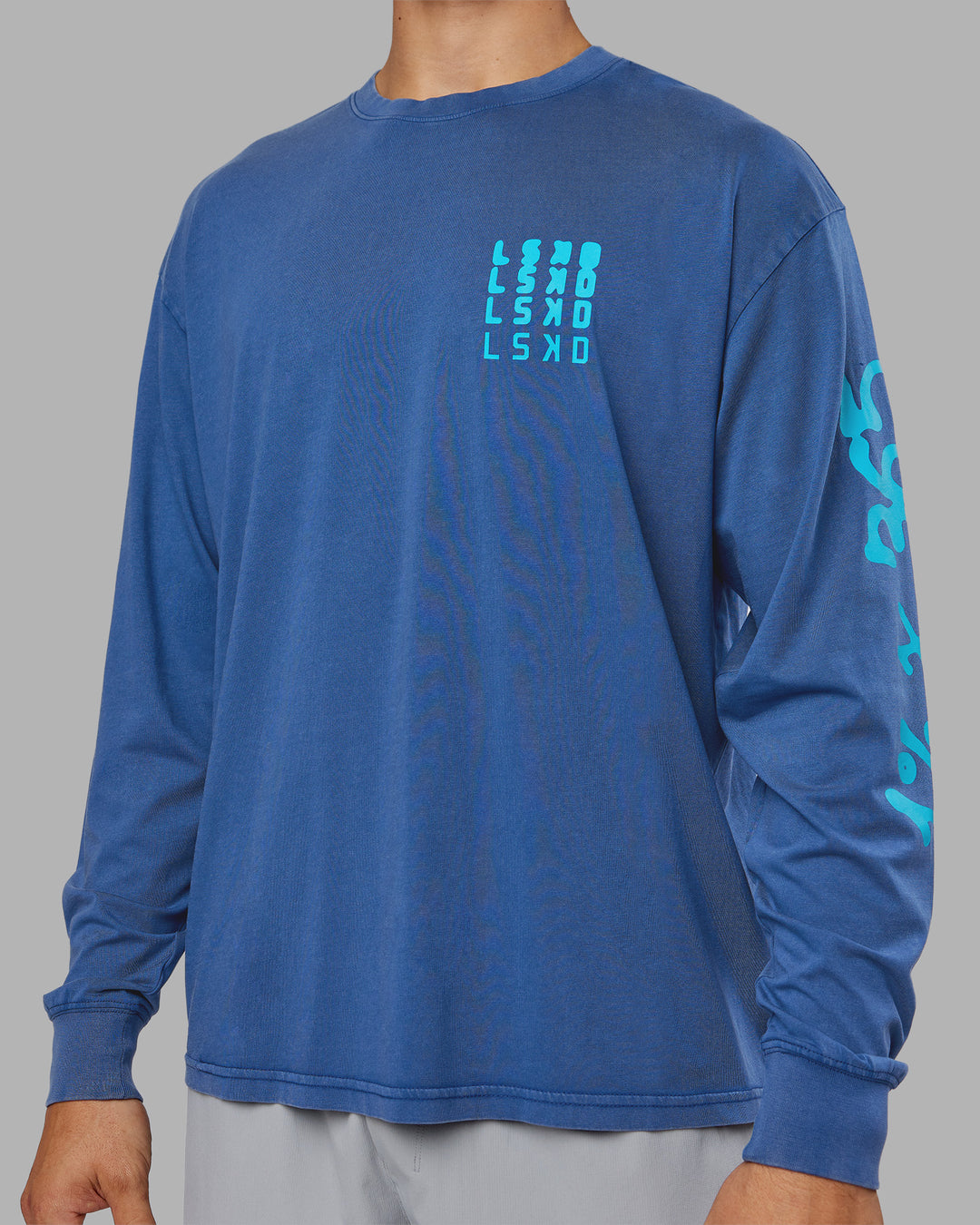Man wearing Inferno Journey FLXCotton Oversized Long Sleeve Tee - Midnight Blue-Blue Bird | Model:Jackson | Size:L - view 13