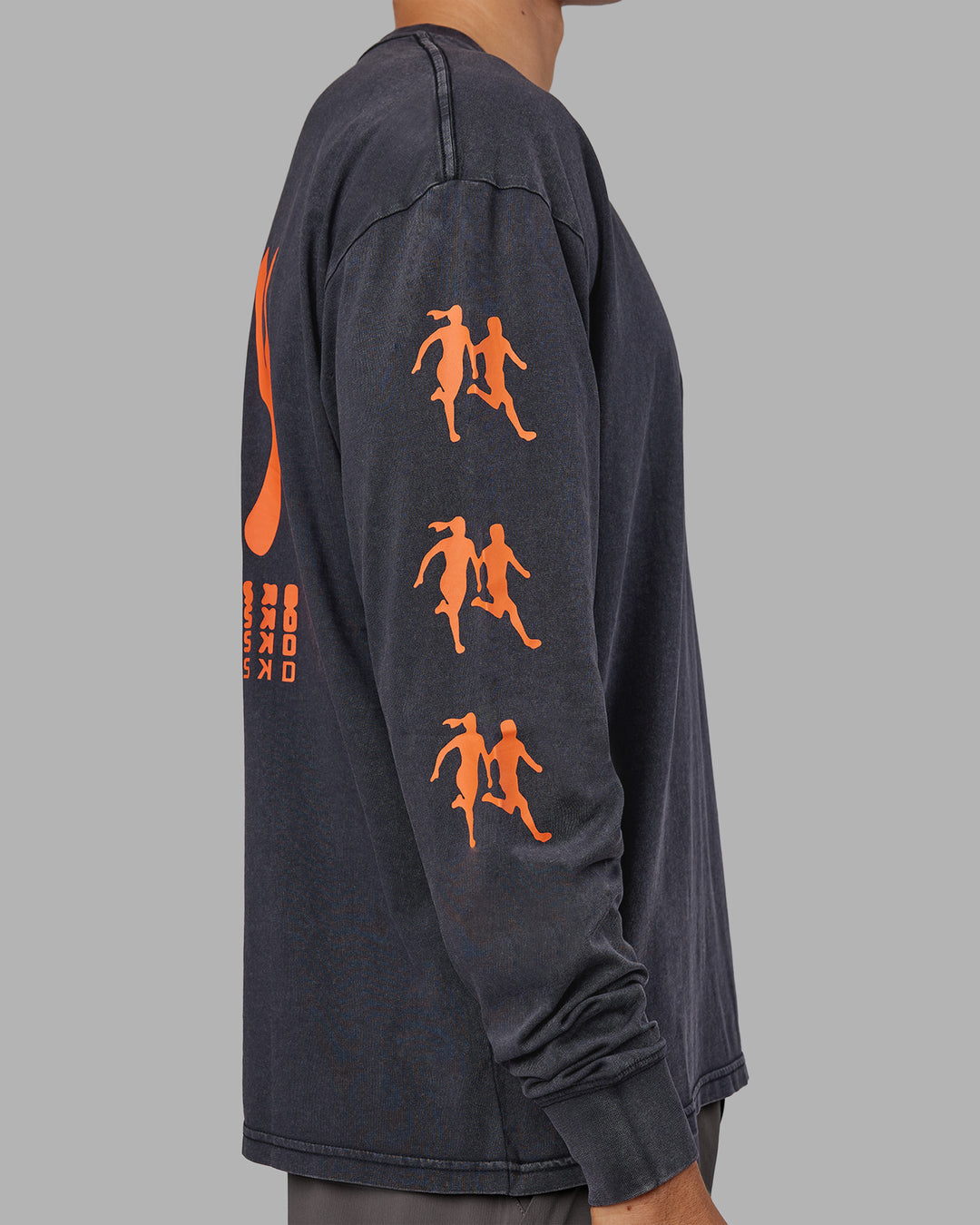 Man wearing Inferno Journey FLXCotton Oversized Long Sleeve Tee - Washed Black-Ultra Orange | Model:Jackson | Size:L - view 7