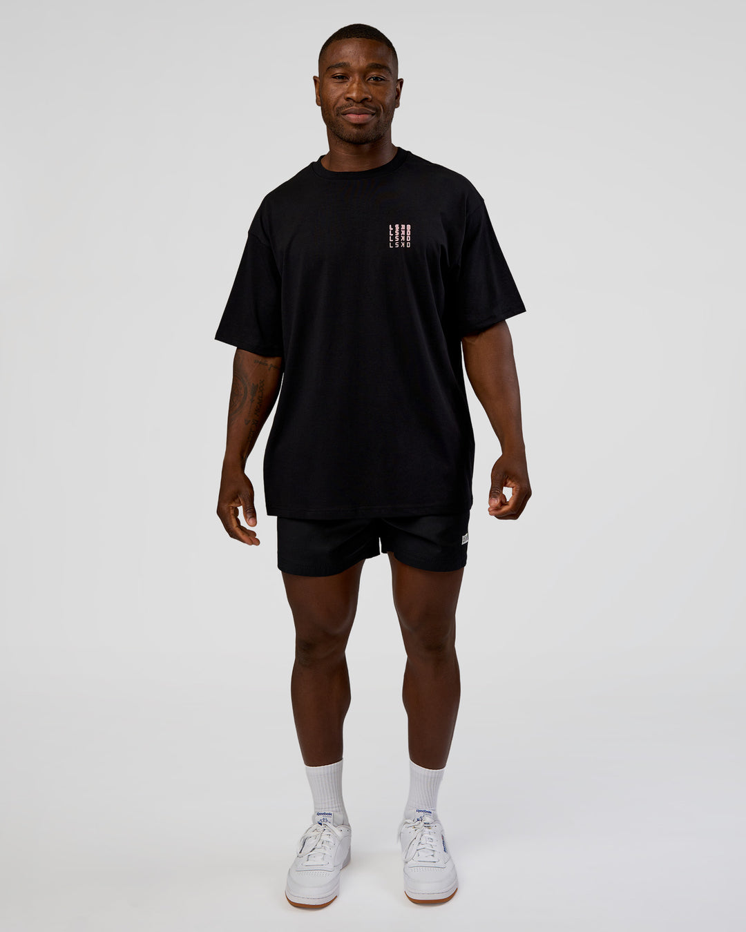 Man wearing Inferno Journey FLXCotton Oversized Tee - Black-Ultra Fuchsia | Model:Sam | Size:L - view 10
