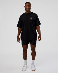 Man wearing Inferno Journey FLXCotton Oversized Tee - Black-Ultra Fuchsia | Model:Sam | Size:L | Thumbnail Index: 9