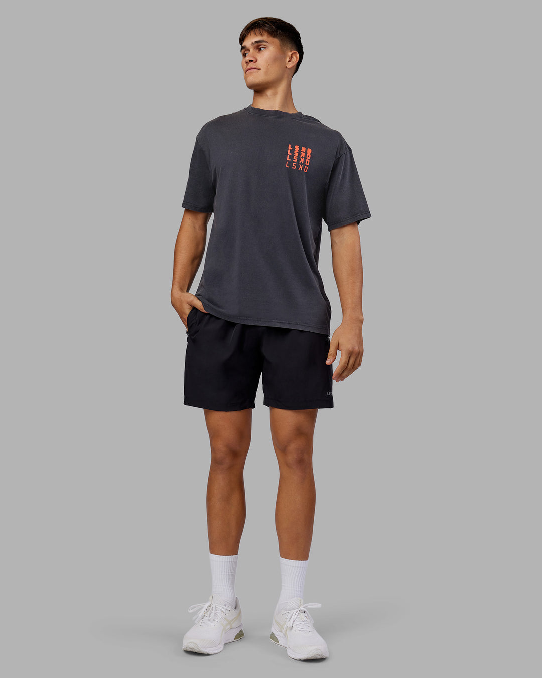 Man wearing Inferno Journey FLXCotton Oversized Tee - Black Washed-Ultra Orange | Model:Jackson | Size:L - view 8