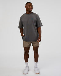 Man wearing Inferno Journey FLXCotton Oversized Tee - Dark Storm Washed-Iceberg Green | Model:Sam | Size:L | Thumbnail Index: 5