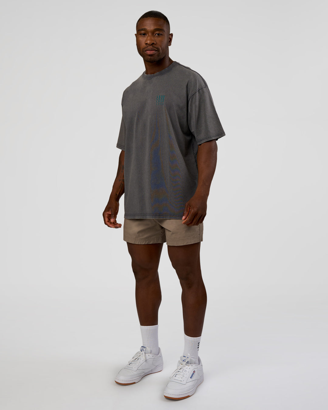 Man wearing Inferno Journey FLXCotton Oversized Tee - Dark Storm Washed-Iceberg Green | Model:Sam | Size:L - view 10