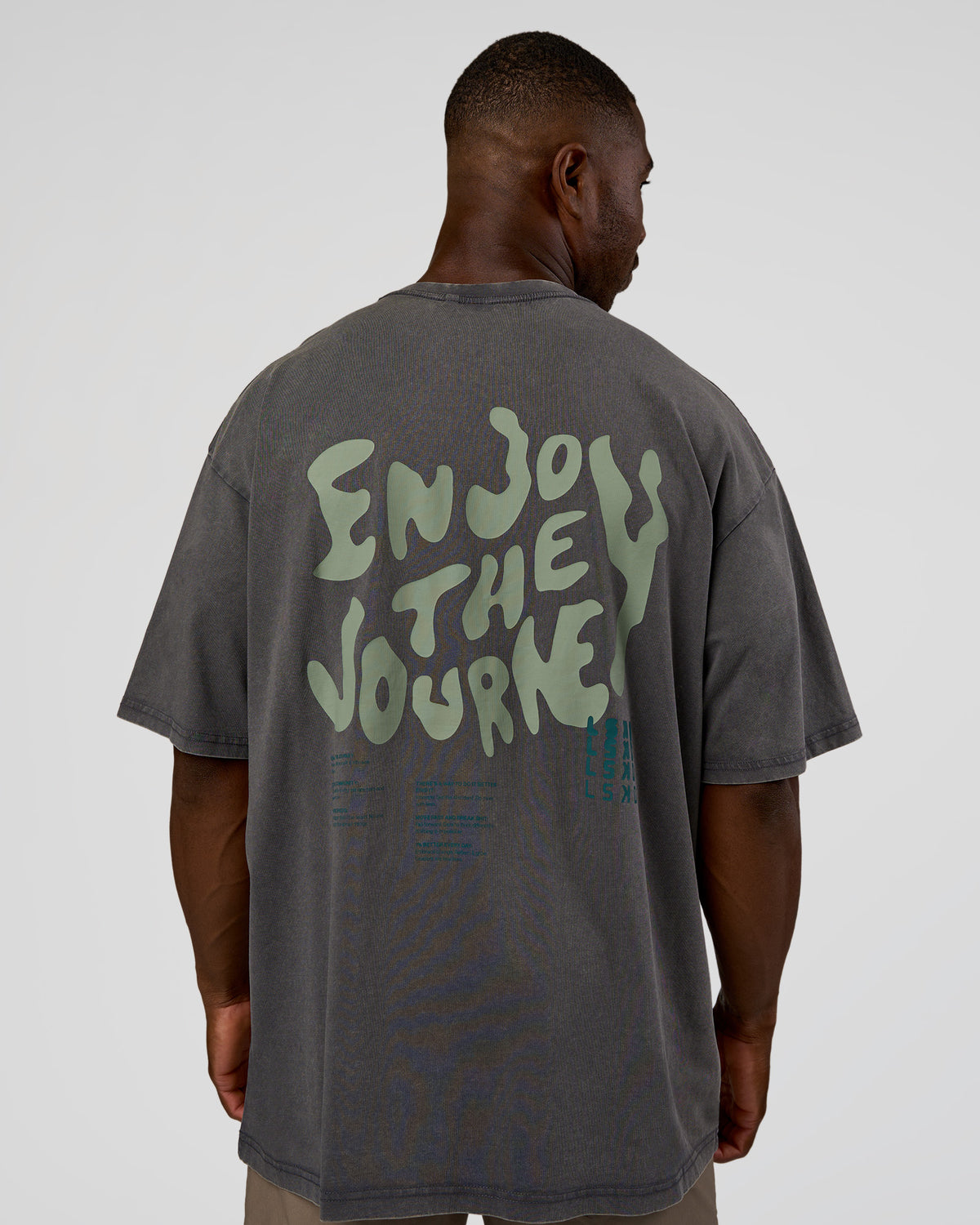 Man wearing Inferno Journey FLXCotton Oversized Tee - Dark Storm Washed-Iceberg Green | Model:Sam | Size:L