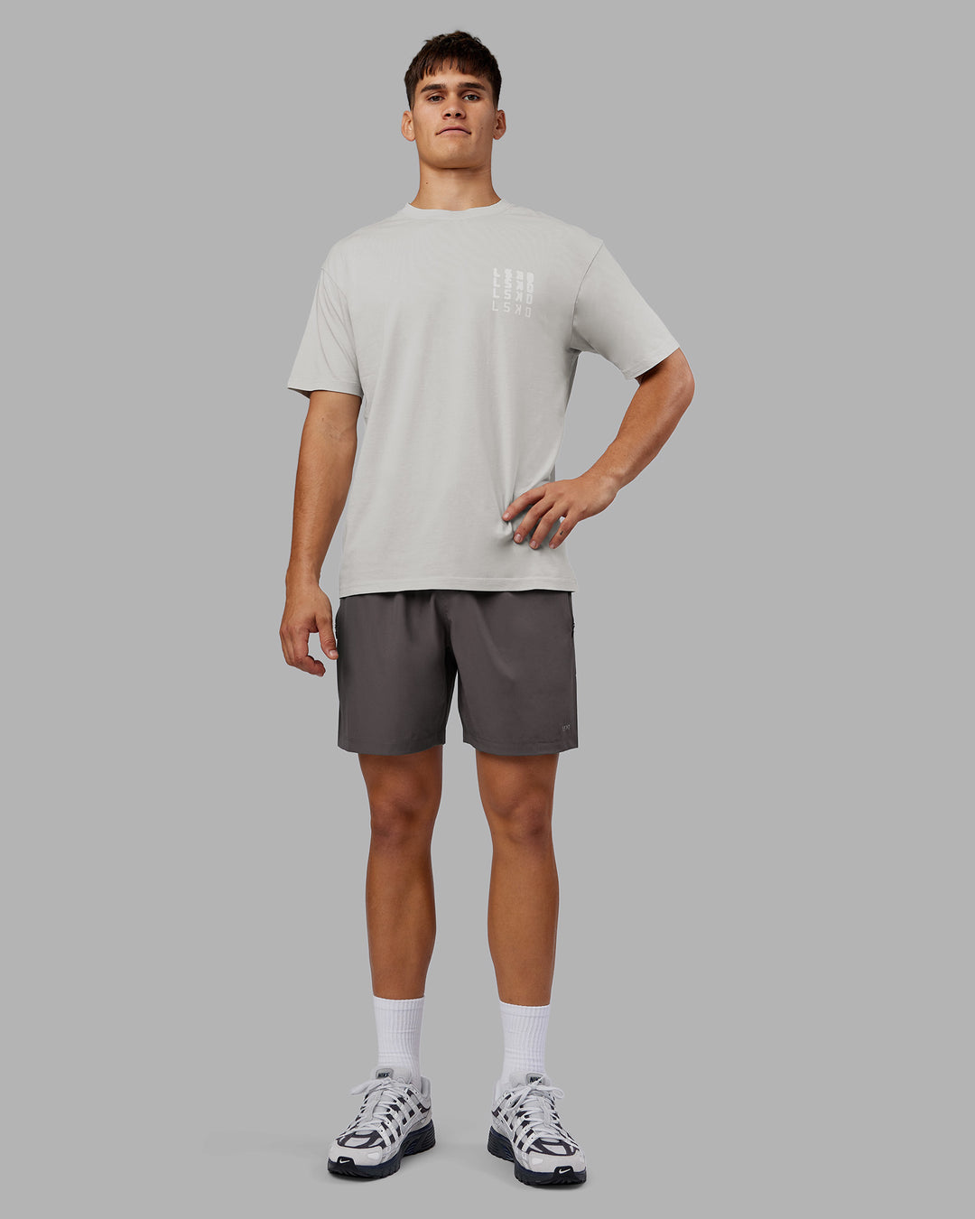 Man wearing Inferno Journey FLXCotton Oversized Tee - Digital Mist Washed-White | Model:Jackson | Size:L - view 9