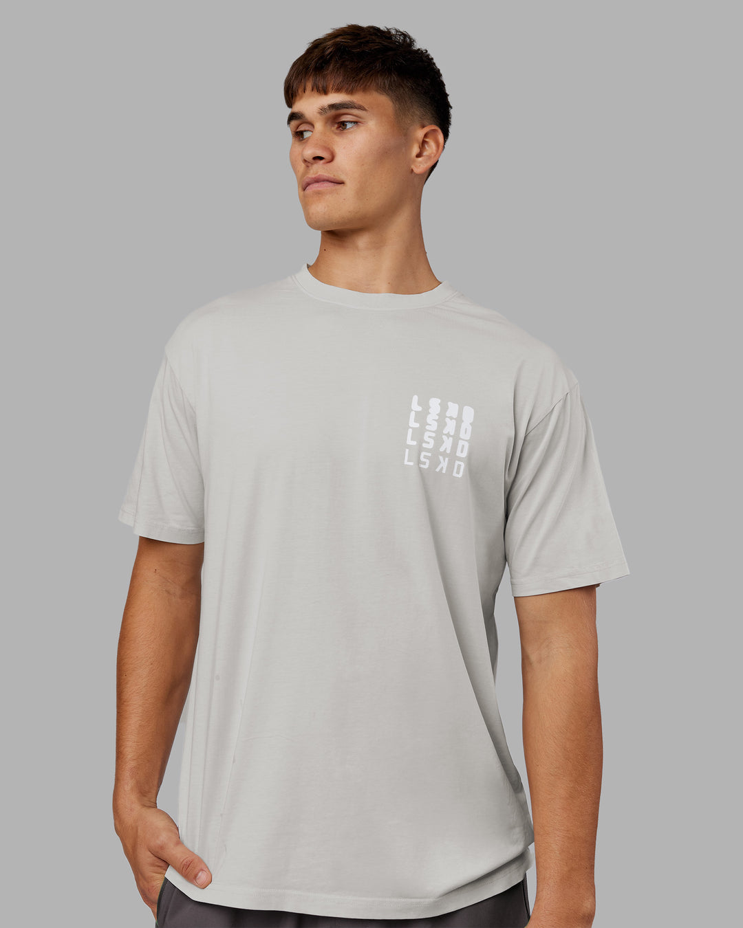Man wearing Inferno Journey FLXCotton Oversized Tee - Digital Mist Washed-White | Model:Jackson | Size:L - view 4
