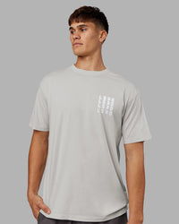Man wearing Inferno Journey FLXCotton Oversized Tee - Digital Mist Washed-White | Model:Jackson | Size:L | Thumbnail Index: 3