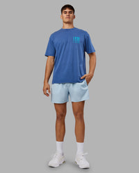 Man wearing Inferno Journey FLXCotton Oversized Tee - Midnight Blue Washed-Blue | Model:Jackson | Size:L | Thumbnail Index: 8