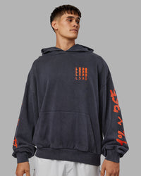 Man wearing Journey Washed Unisex Oversize Hoodie - Black-Ultra Orange | Model:Jackson | Size:L | Thumbnail Index: 4