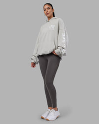 Woman wearing Journey Washed Unisex Oversize Hoodie - Digital Mist-White | Model:Rhiley | Size:L | Thumbnail Index: 11