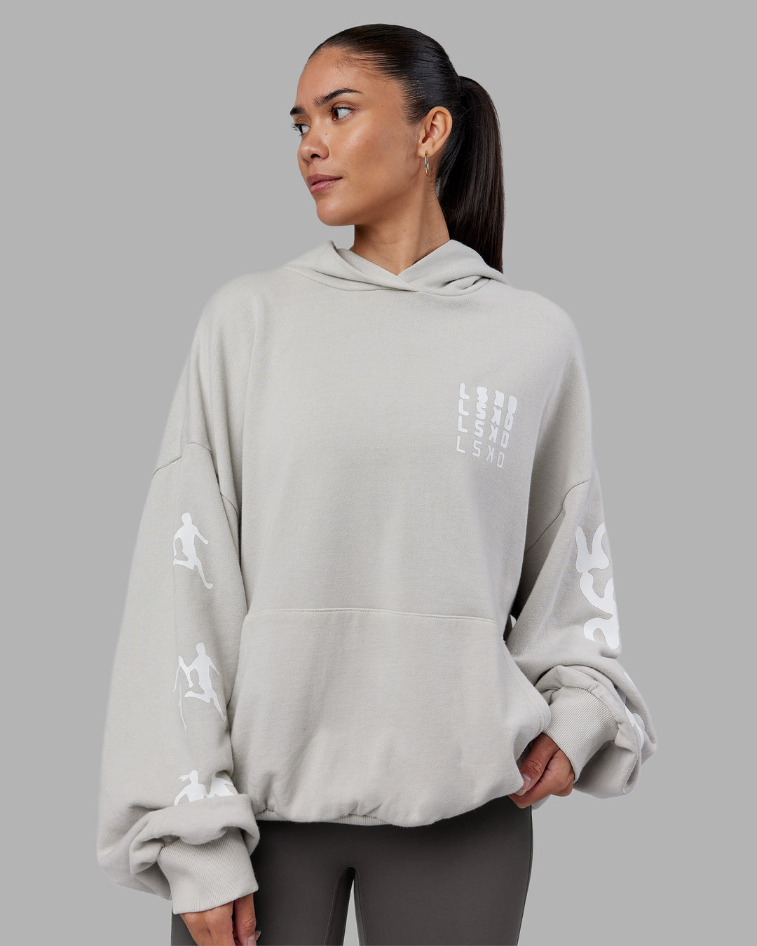 Woman wearing Journey Washed Unisex Oversize Hoodie - Digital Mist-White | Model:Rhiley | Size:L - view 4