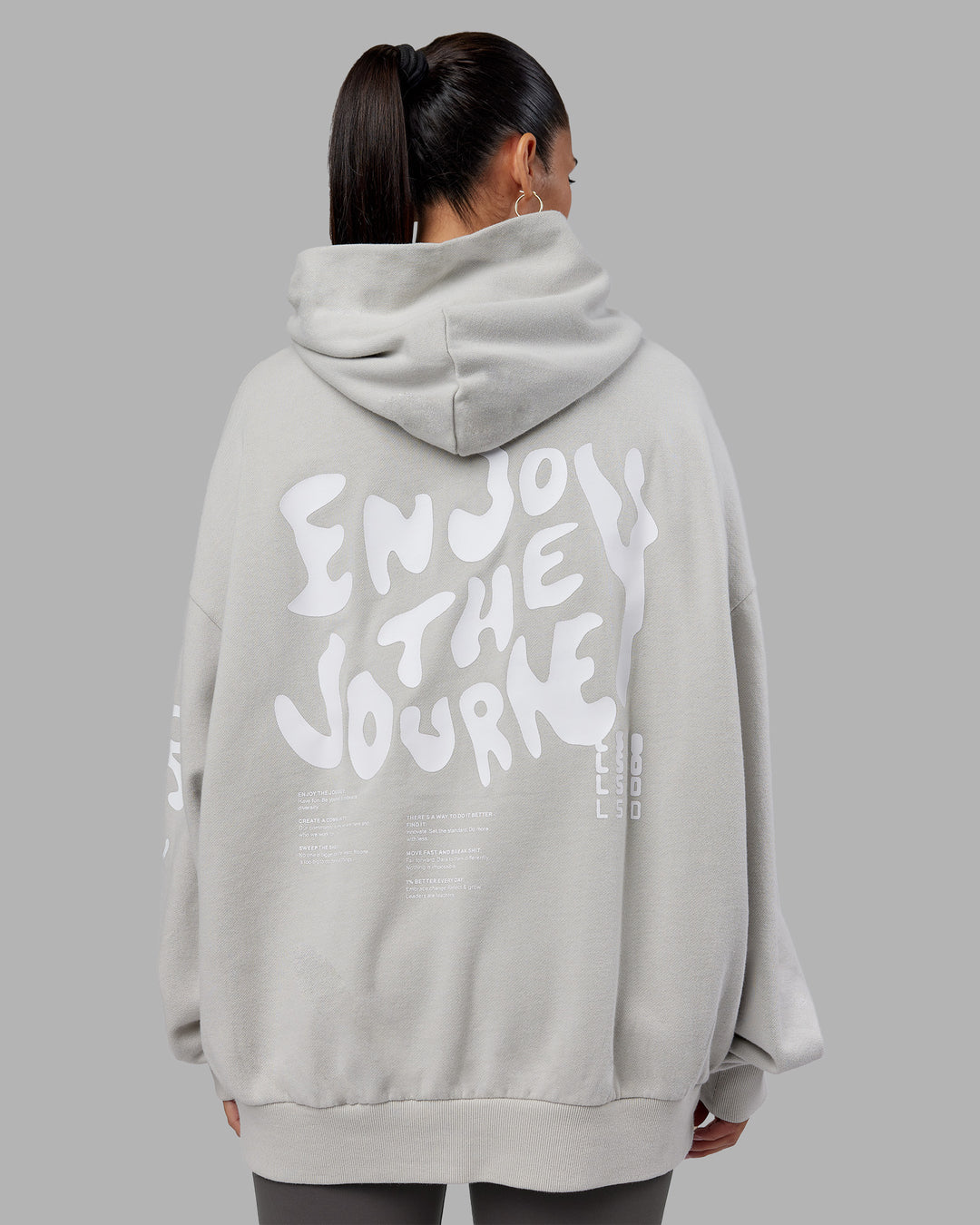 Woman wearing Journey Washed Unisex Oversize Hoodie - Digital Mist-White | Model:Rhiley | Size:L - view 2