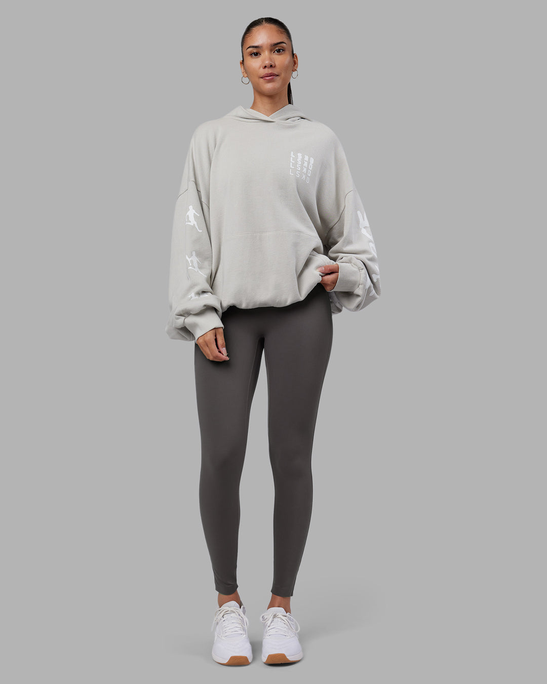 Woman wearing Journey Washed Unisex Oversize Hoodie - Digital Mist-White | Model:Rhiley | Size:L - view 7