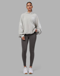 Woman wearing Journey Washed Unisex Oversize Hoodie - Digital Mist-White | Model:Rhiley | Size:L | Thumbnail Index: 6
