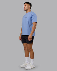 Man wearing Just Run FLXCotton Oversized Tee - Soft Blue-Dark Storm | Model:Kaelyb | Size:L | Thumbnail Index: 11