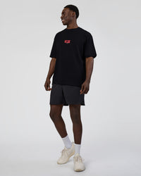 Man wearing Kettle B FLXCotton Oversized Tee - Black-White | Model:Paabio | Size:L | Thumbnail Index: 2