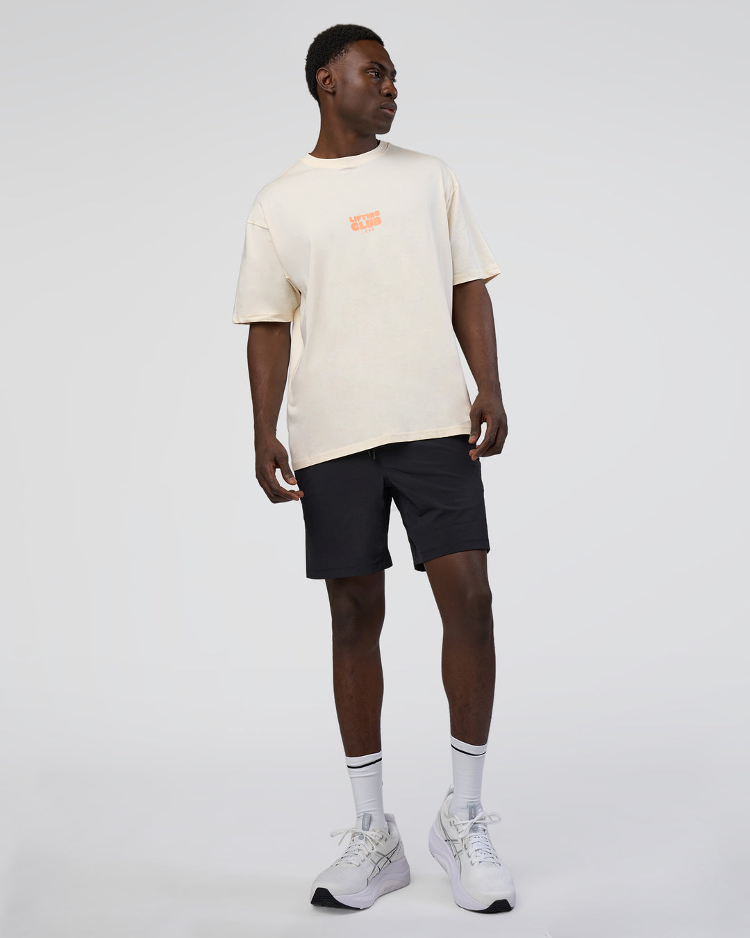 Man wearing Kettle B FLXCotton Oversized Tee - Sugar Swizzle-Cantaloupe | Model:Paabio | Size:L - view 7