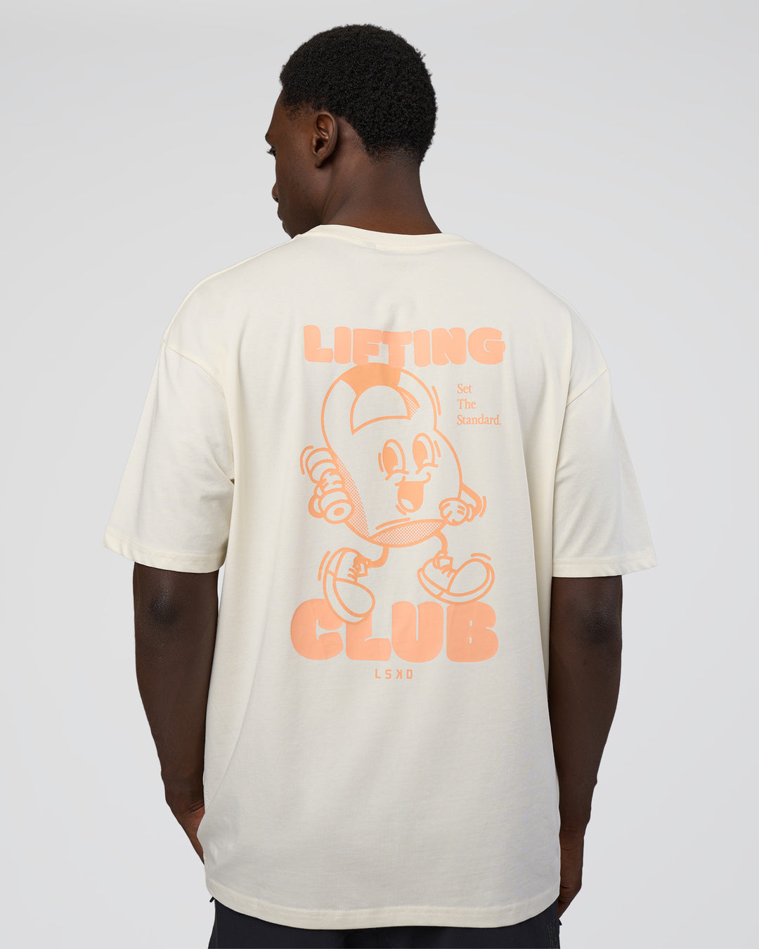 Man wearing Kettle B FLXCotton Oversized Tee - Sugar Swizzle-Cantaloupe | Model:Paabio | Size:L - view 2
