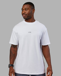 Man wearing Kettlebell FLXCotton Oversized Tee - White-Black | Model:Sam | Size:L | Thumbnail Index: 3
