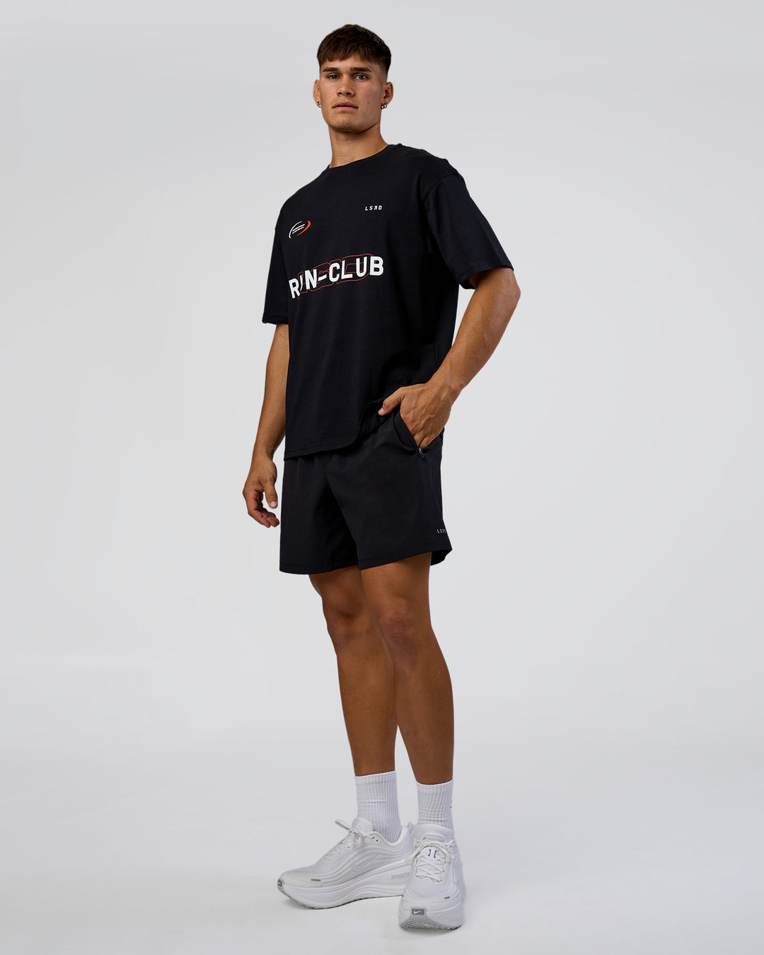 Man wearing LSKD Run Club FLXCotton Oversized Tee - Black-White | Model:Jackson | Size:L - view 5