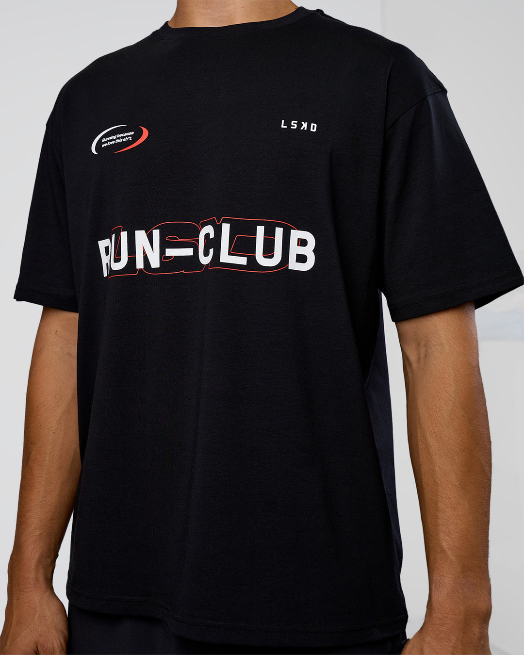 Man wearing LSKD Run Club FLXCotton Oversized Tee - Black-White | Model:Jackson | Size:L - view 8