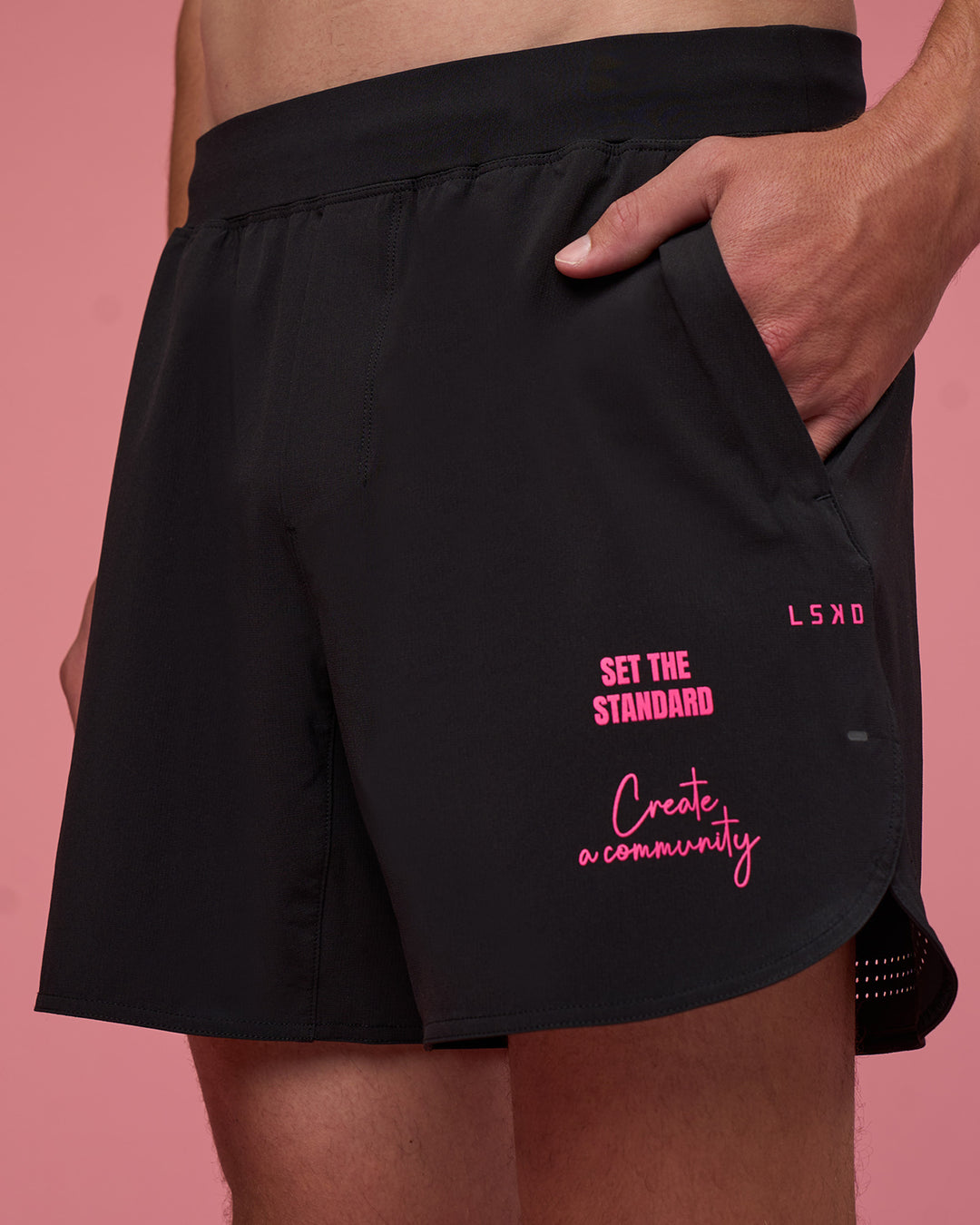 Man wearing Lift 6" Short - Black-Ultra Pink | Model:Brandon | Size:L - view 1