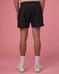 Man wearing Lift 6" Short - Black-Ultra Pink | Model:Brandon | Size:L | Thumbnail Index: 3